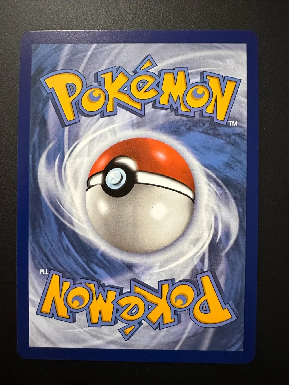 Pokemon card being